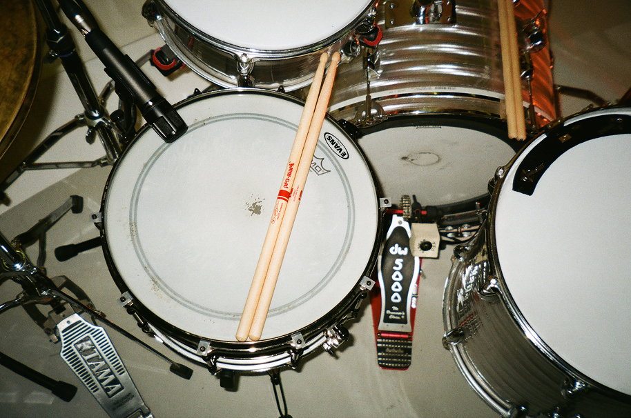 Drum kit with sticks from above