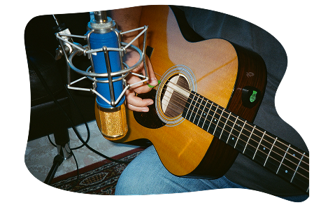 Acoustic guitar and microphone