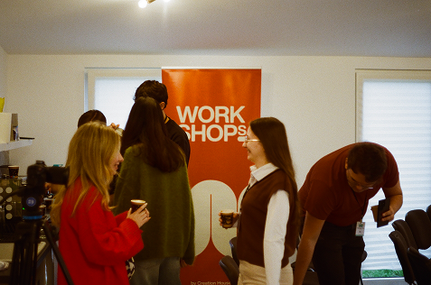 People talking at a workshop